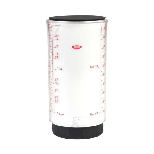ADJUSTABLE MEASURING CUP